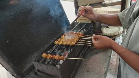 Preparing grilled skewered meatballs Video stock 258179725