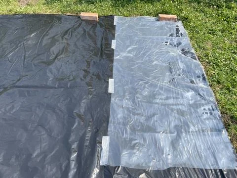 Preparing ground base for inflatable pool Stock Photos