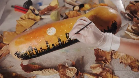 Preparing for Halloween. Drawing a full moon, a night city Stock Footage 321140642