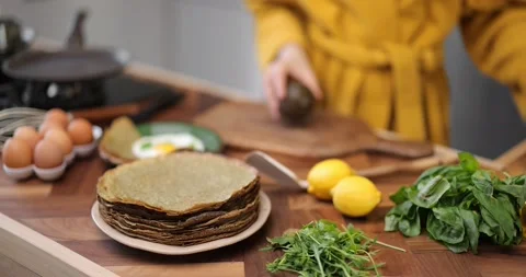 Preparing healthy breakfast on the kitchen table Stock Footage 150089410