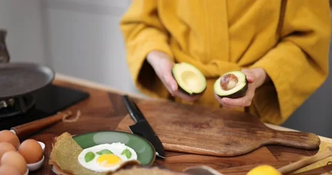 Preparing healthy breakfast on the kitchen table Stock Footage 150089463
