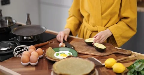 Preparing healthy breakfast on the kitchen table Stock Footage 150089532