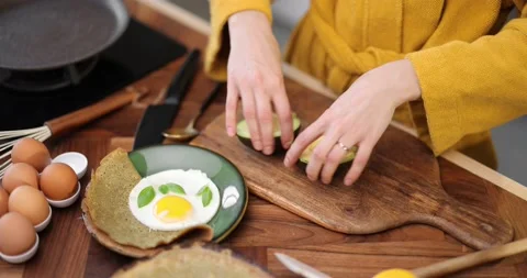 Preparing healthy breakfast on the kitchen table Stock Footage 150089589