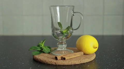 Preparing healthy green tea with mint and cinnamon Stock Footage 59608101