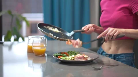 Preparing a Healthy Meal in a Modern Kitchen Using Fresh and Wholesome  Stock Footage 293488690