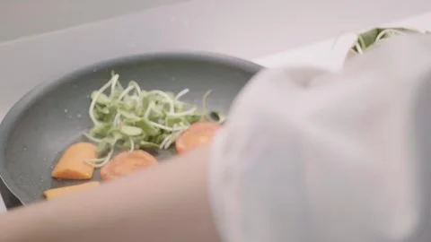 Preparing Healthy Vegetable Plate with Fresh Ingredients Stock Footage 314570248