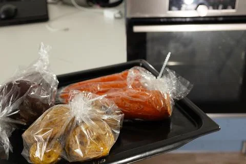 Preparing Healthy Vegetables for Baking in a Baking Sleeve Stock Photos