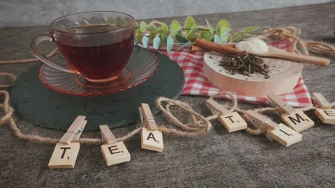 Preparing Herbal Tea Drink in Clear Glass Cup on Textured Surface Stock Footage 313364371