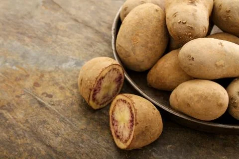 Preparing heritage potatoes Stock Photos