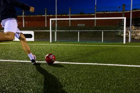 Preparing to hit a soccer ball Stock Photos