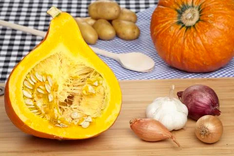 Preparing a hokkaido pumpkin Stock Photos