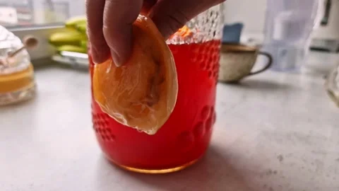 Preparing a home made kombucha from the black tea Stock Footage 234061491