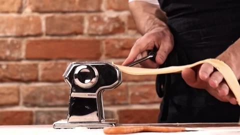 Preparing home made pasta with pasta maker. Stock Footage 150779975