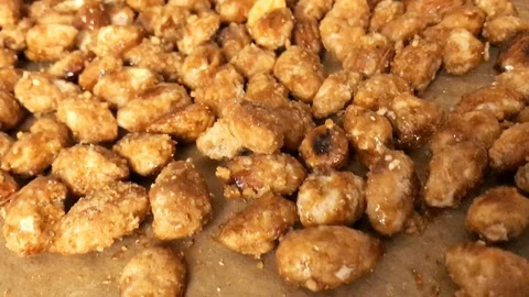 Preparing homemade candied almonds Stock Footage 120021207