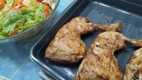 Preparing homemade dinner with roasted chicken and fresh salad Stock Footage 341512614
