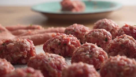 Preparing Homemade Meatballs in Kitchen. Stock Footage 256243124
