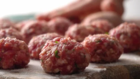 Preparing Homemade Meatballs in Kitchen. Stock Footage 256243160
