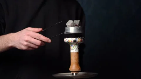 Preparing hookah. Step by step. Hookah man is shifting coals. Stock Footage 153217258