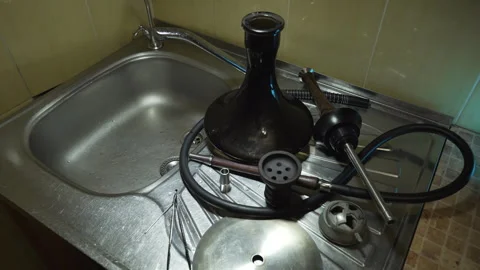 Preparing a hookah. Step by step. Hookah in disassembled form. Stock Footage 256057758