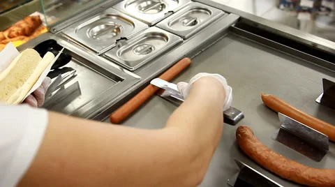 Preparing of a hot-dog Stock Footage 56888184