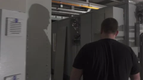 Preparing the industrial machine to work, and short look in at the robots, Stock Footage 149256319