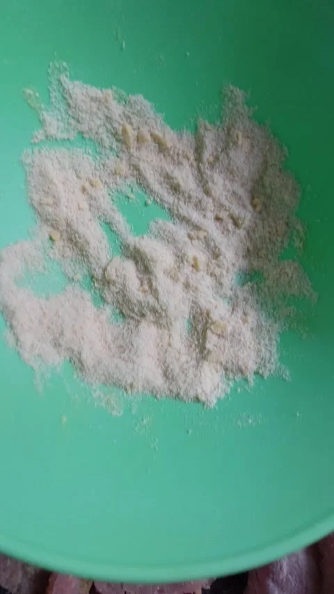 Preparing ingredients for breading meat with egg wash and breadcrumbs Stock Footage 334393211