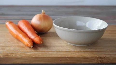 Preparing ingredients for making a soup. Stock Footage 142524020