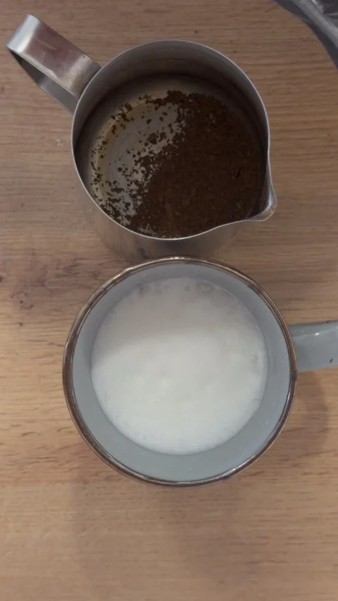 Preparing instant coffee with frothy milk Stock Footage 338426977