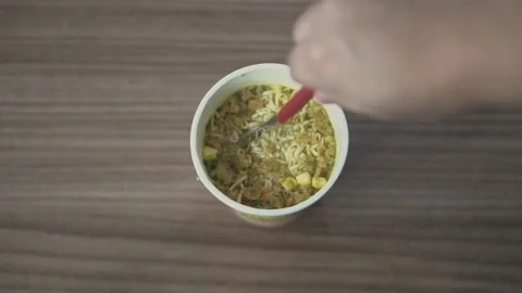 Preparing instant noodle in a cup Stock Footage 137676753