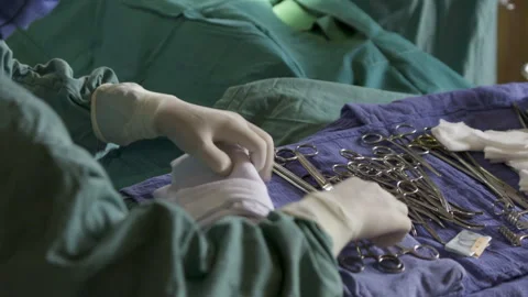 Preparing instruments in the operating room Stock Footage 257537800