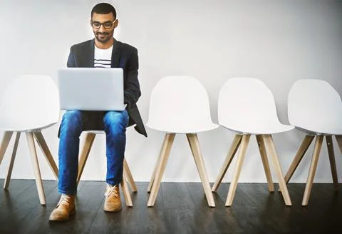 Preparing an interesting introduction before his interview. Shot of a young Stock Photos