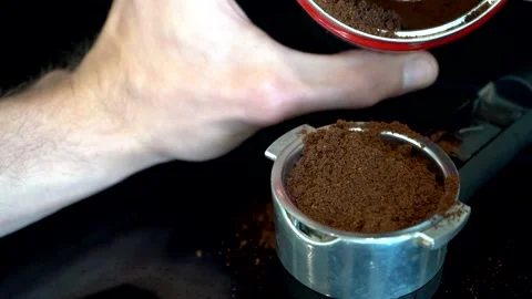 Preparing Italian espresso for coffee machine in slow motion Video stock 132348410