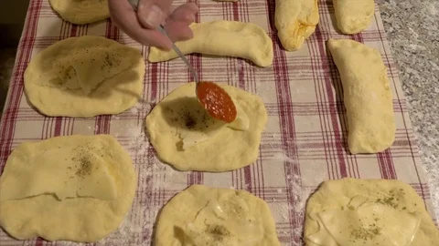 Preparing italian stuffed panzerotti - front view Stock Footage 83781720