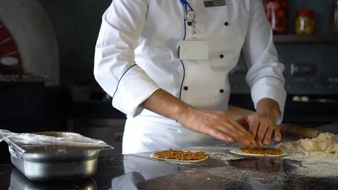 Preparing lahmacun in a restaurant Stock Footage 106480875