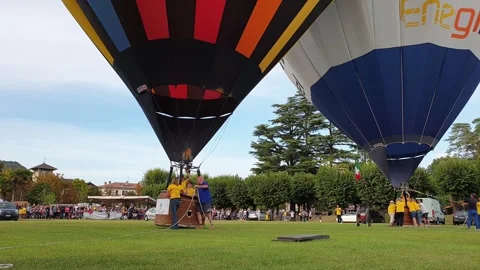 Preparing to launch hot air balloon in angera, long shot Stock Footage 280892200