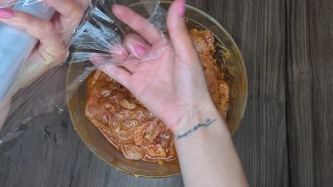Preparing Legs Chicken For Marinating 動画素材 166638054