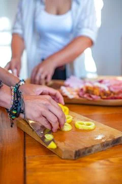 Preparing Lemon Slices in Kitchen Stock Photos