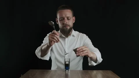 Preparing of Lexus Cocktail. Bartender pouring irish cream into glass Stock Footage 132729795