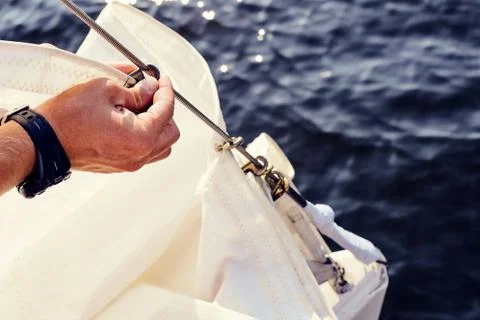 Preparing before lifting staysail sails Stock Photos