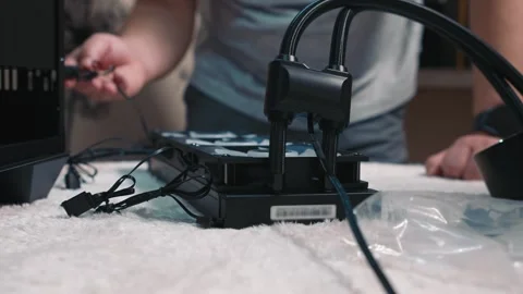 Preparing liquid cooling system for installation into computer case Stock Footage 324592296