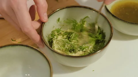 Preparing marinade for meat in the kitchen. Cooking food concept Stock Footage 256455056