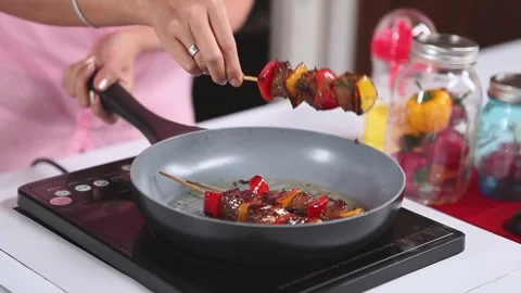 Preparing Marinated Beef Satay with Fresh Vegetables on Wooden Skewers Stock Footage 336536637