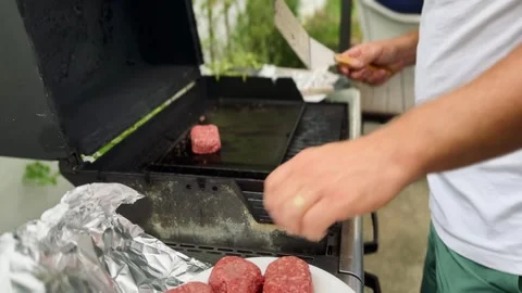Preparing a meal. BBQ on the yard Stock Footage 282677991