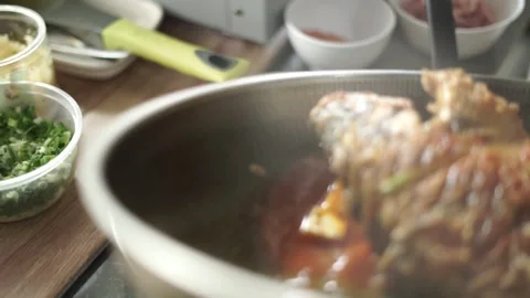 Preparing a meal in the kitchen Stock Footage 261248623