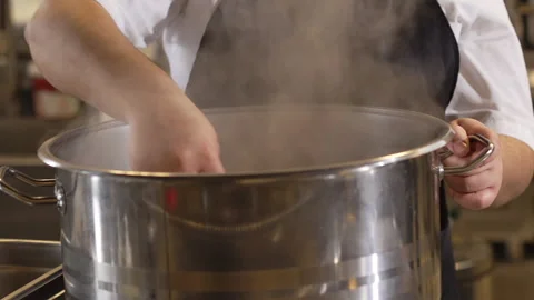 Preparing the meal in the restaurants kitchen Stock Footage 236994774