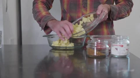 Preparing a Meal: Transferring Freshly Diced Potatoes Vídeos de archivo 322750439