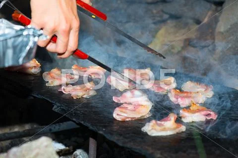 Preparing meat grilled Stock Photos