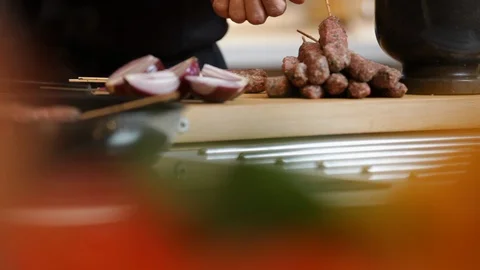 Preparing meat kebab skewers. Stock Footage 106077950