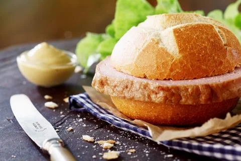 Preparing a meat loaf roll in a rustic kitchen Stock Photos