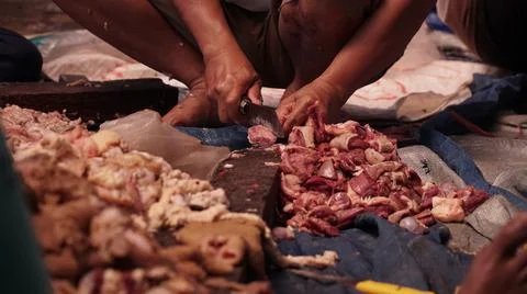 Preparing Meat at the Market Stock Photos